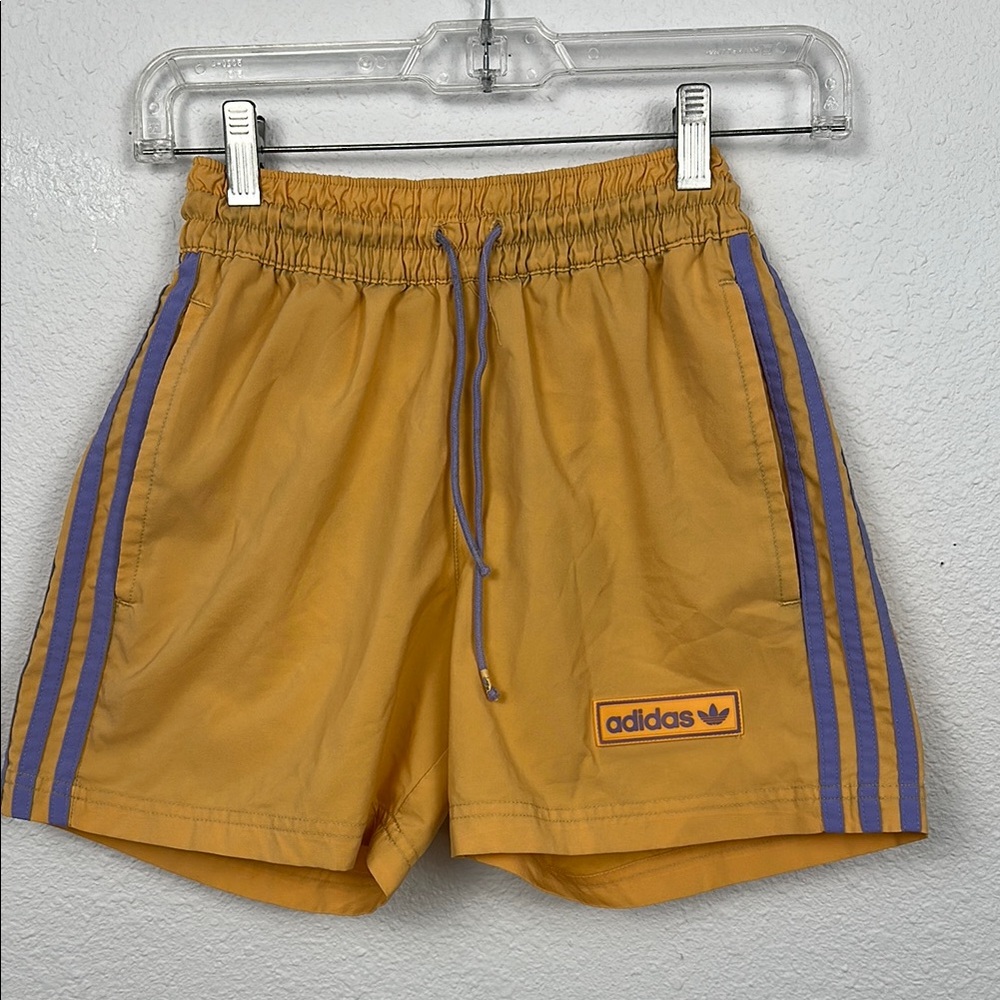 Yellow Athletic Shorts with Purple Stripes